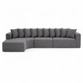 Sofá modular en L tapizado en tejido de poliéster gris con chaise longue lateral y cojines 300 x 160 x 85 cm